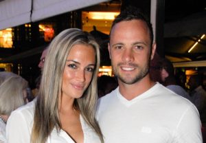 Reeva Steenkamp e Oscar Pistorius | © AFP / Getty Images