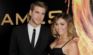 Miley Cyrus e Liam Hemsworth | © Kevin Winter / Getty Images