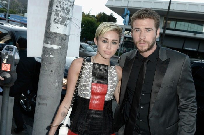 Miley Cyrus e Liam Hemsworth | © Kevin Winter / Getty Images