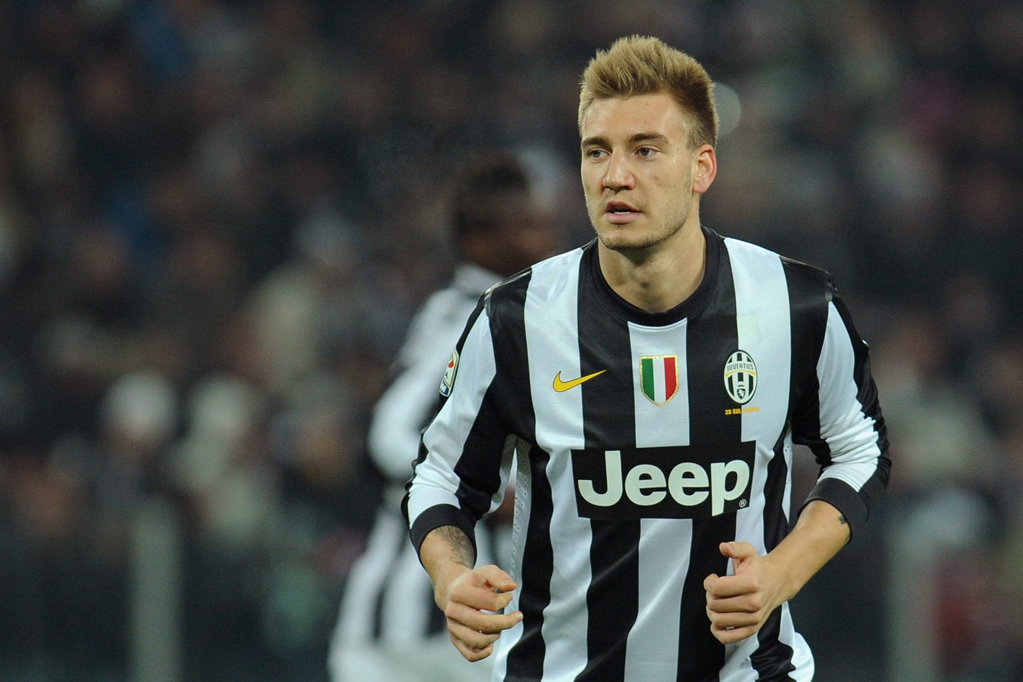 Bendtner, intervento riuscito | © Valerio Pennicino/Getty Images