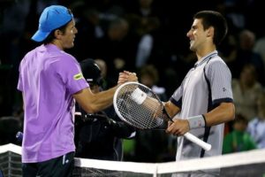 Djokovic saluta Hass ©Matthew Stockman/Getty Images