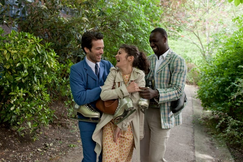 Roman Duris, Audrey Tatou e Omar Sy in una scena di Mood Indigo